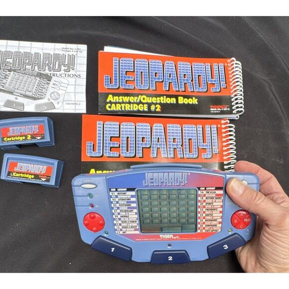 1995 Jeopardy Handheld Game Tiger Electronics Tested 2 Cartridge & Books -A75 - Picture 4 of 9